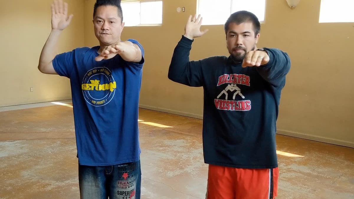 Ceech teaching arm popping technique